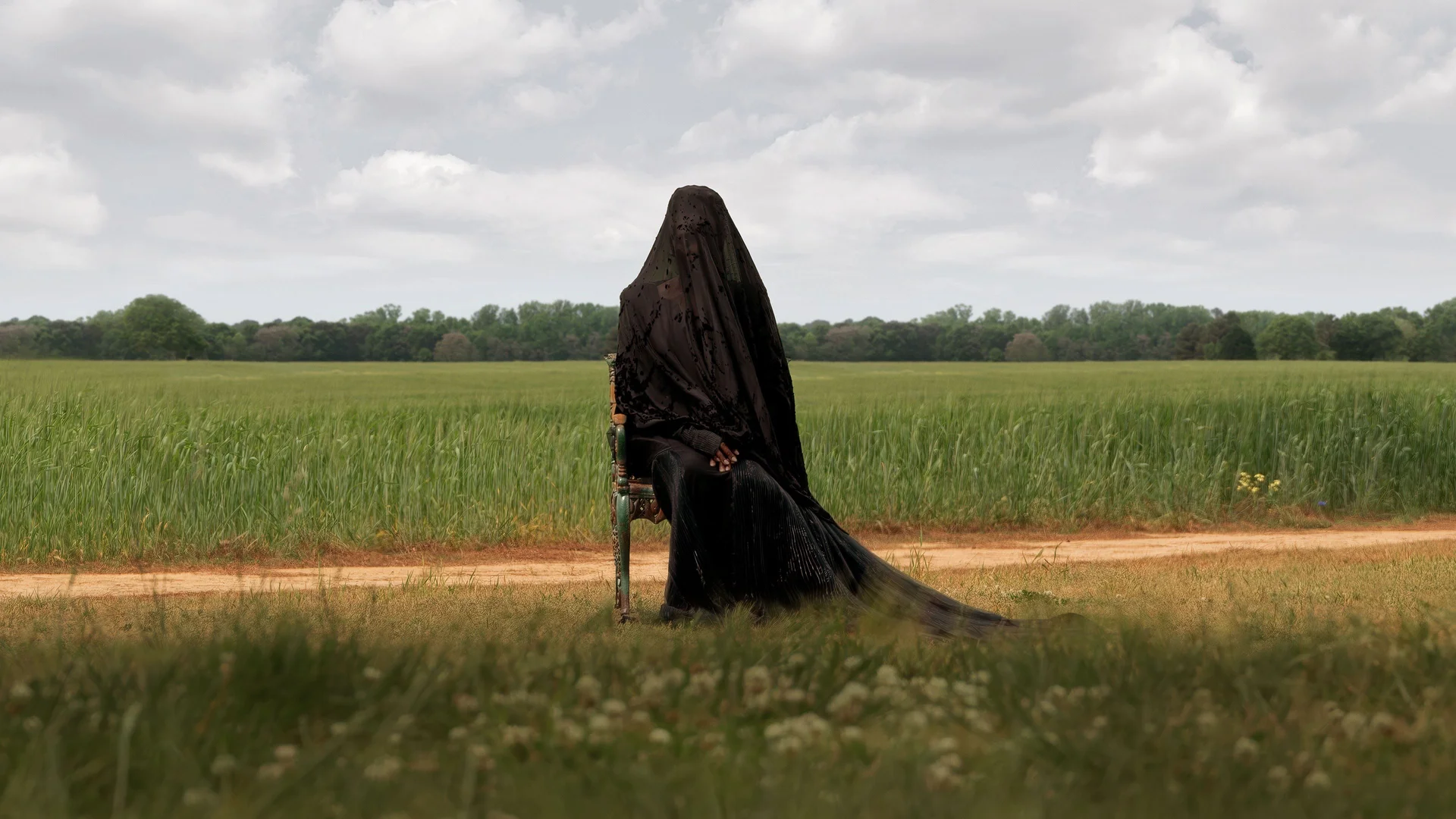 Backdrop de La mujer de las sombras