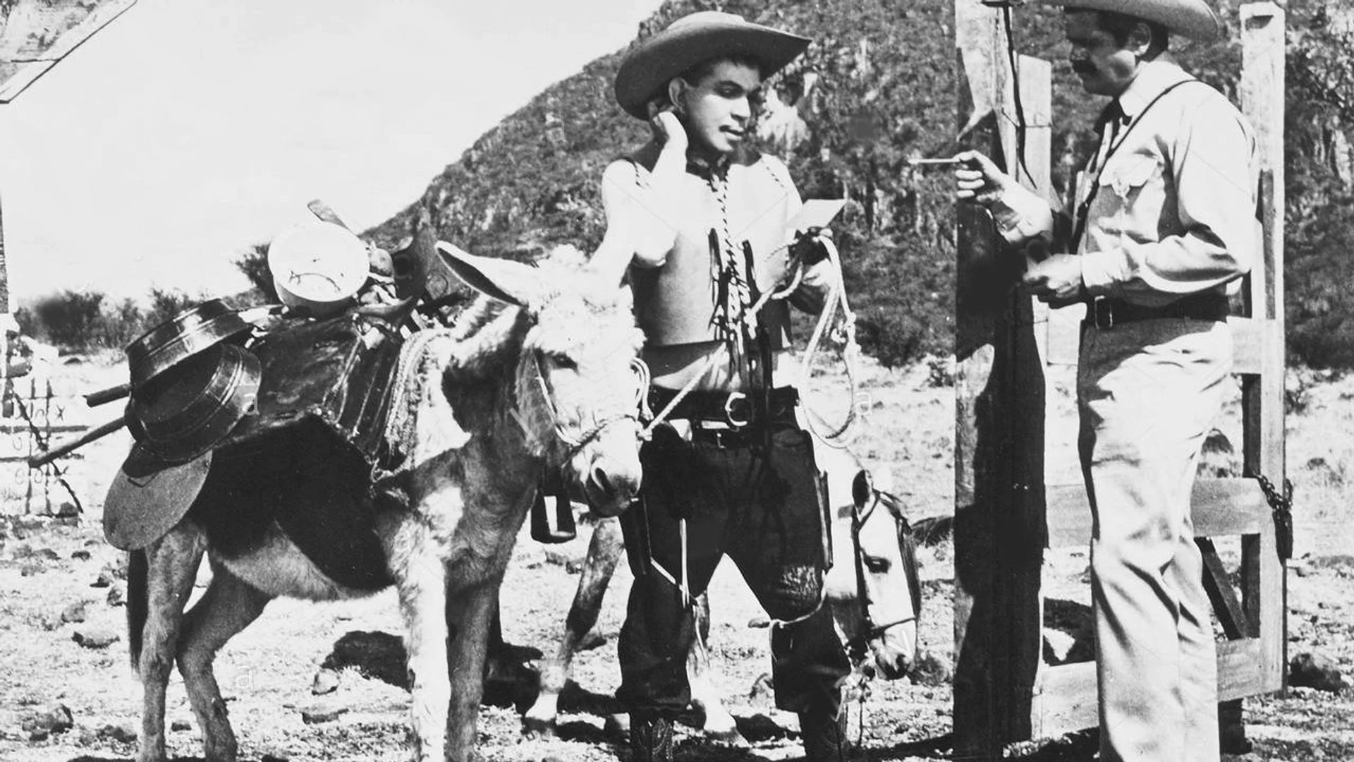 Backdrop de Por mis pistolas