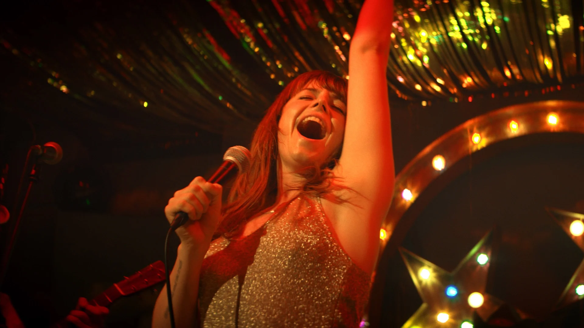 Backdrop de Wild Rose: Sigue tu propia canción