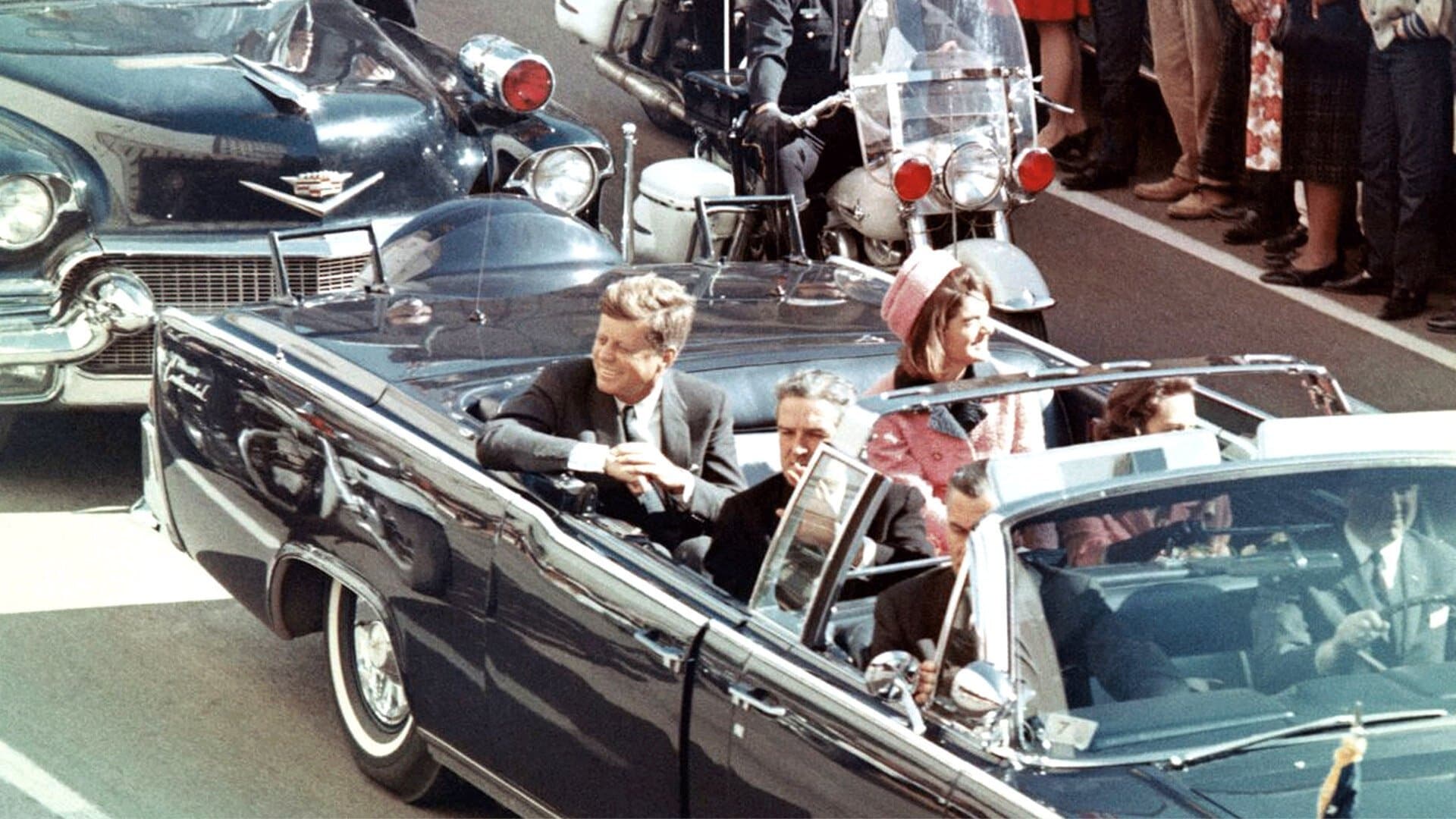 Backdrop de JFK Revisited: Through the Looking Glass